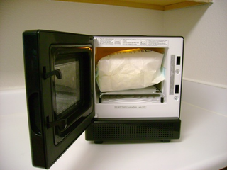Illustration for article titled Lightning Review: iWavecube Ultra-Mini Microwave